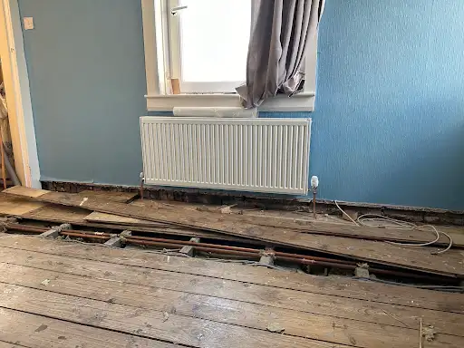 Radiator installation progress by TMS Plumbing & Heating